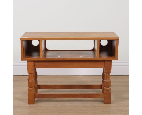 ROBERT MOUSEMAN THOMPSON OF KILBURN; AN OAK RECTANGULAR TABLE BASEWith four octagonal baluster supports and later top, the ba