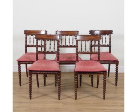 A SET OF FOUR REGENCY ROSEWOOD BAR BACK DINING CHAIRS (5)With bobbin turned decoration and a matching beech framed example, 4