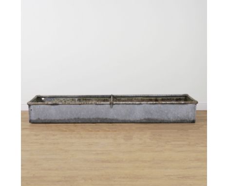 A LARGE RECTANGULAR RIVETED ALUMINIUM TROUGH246cm wide; 49cm deep; 33cm highThis lot is not water tight as there are holes on