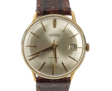 A ROAMER GOLD CIRCULAR CASED GENTLEMAN'S WRISTWATCHThe signed silvered dial with gilt baton hour markers, gilt hands and with