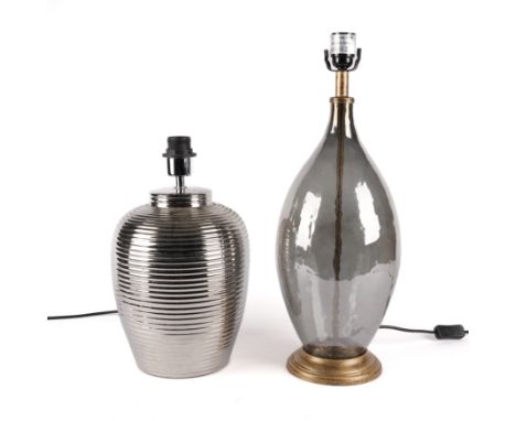 A MODERN SILVERED RIBBED CERAMIC TABLE LAMP (2)Together with a silvered glass table lamp, the tallest 58cm