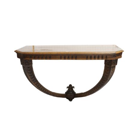 A 19TH CENTURY ITALIAN WALNUT CONSOLE TABLEOn scale carved supports, 140cm wide; 63cm deep; 92cm high