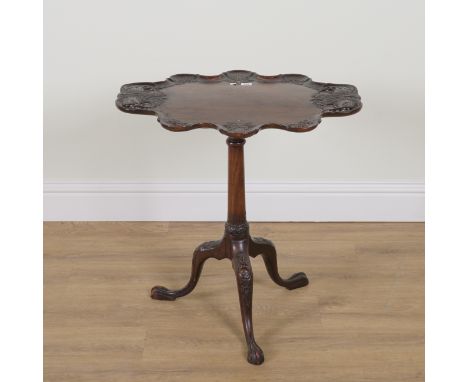 A LATE 19TH CENTURY CARVED MAHOGANY TRIPOD TABLEThe shaped top with eagle carved decoration, 68cm wide; 54cm deep; 70cm highO
