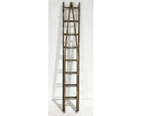 A vintage wooden decorators ladder with tapered end 