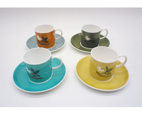 Four Susie Cooper cups and saucers.