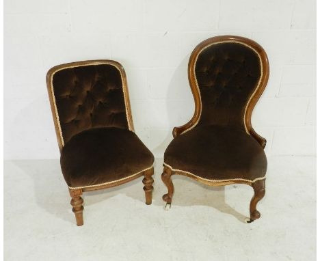 Two Victorian nursing chairs with button-back detailing.