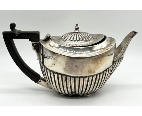 A hallmarked silver bachelor's teapot A/F