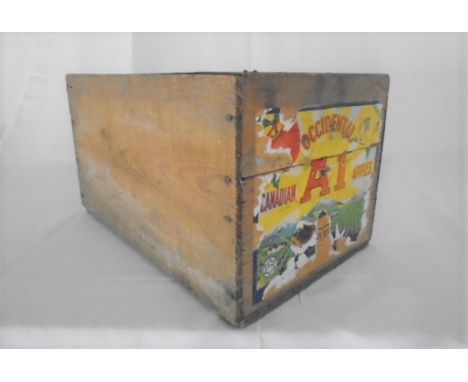 A vintage wooden apple crate with advertising on one end for Occidental Canadian A1 Apples. Lot also includes three vintage b