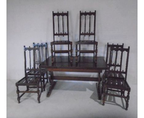 An Ercol refectory style extending table with six chairs