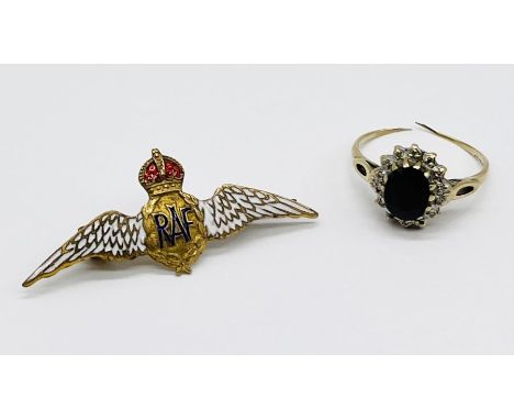 An 9ct gold diamond and sapphire ring (A/F) along with an enamelled RAF sweetheart brooch