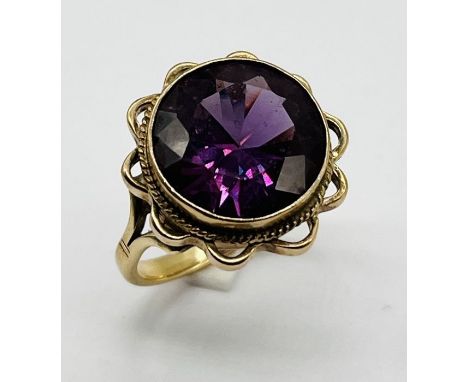 A 9ct gold ring set with a large Alexandrite 