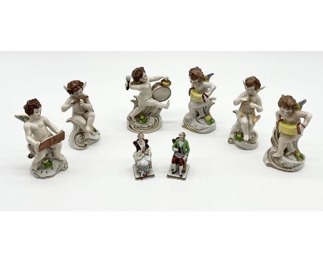 A set of Capodimonte porcelain figures of putti playing musical instruments each on scroll bases with printed marks (height 1