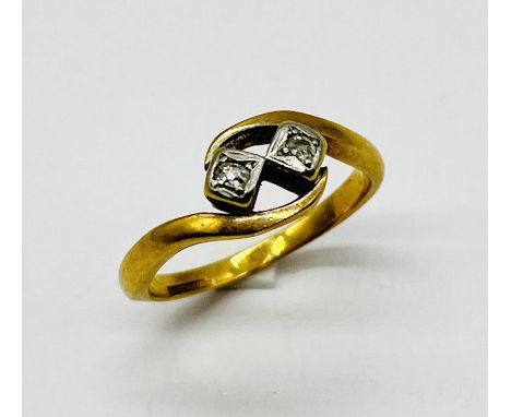 An 18ct gold and platinum diamond two stone ring, weight 4.2g