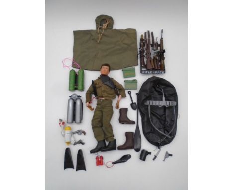 A vintage Action Man marked to rear torso with "Made in England by Palitoy Under License From Hasbro © 1964", along with a se