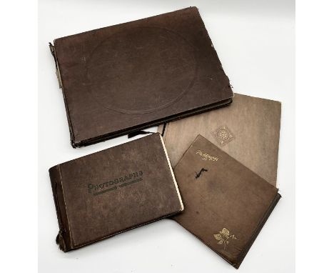 A collection of vintage photo albums, one from a WW2 army officer showing scenes of his life including 9th Lancers, officer's