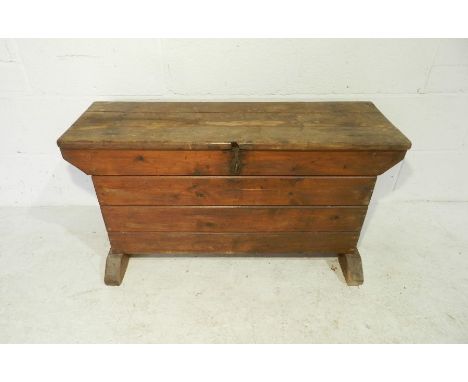 A rustic stained pine trunk, length 90cm.