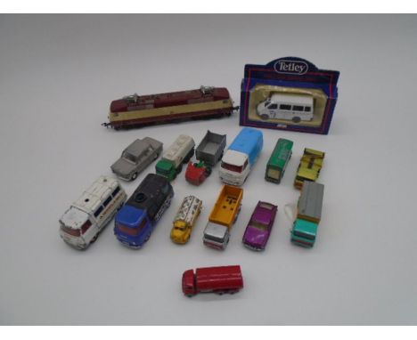 A Fleischmann OO gauge diesel locomotive (120 002-1), along with a small selection of play worn die-cast vehicles