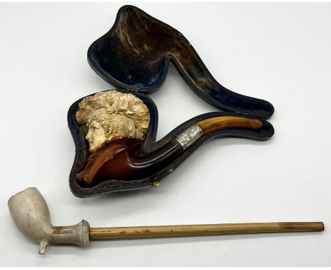 A cased Meerschaum pipe of an Edwardian lady with SCM collar and amber mouthpiece along with a Gambier meerschaum pipe
