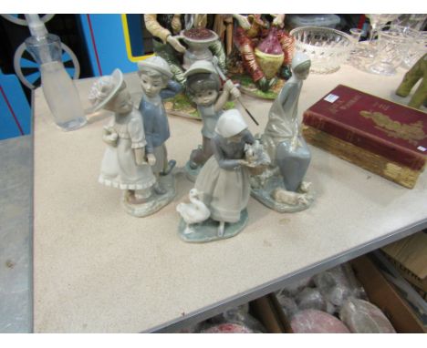 Three Lladro figurines and a Nao figurine a/f (4)