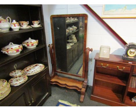 An early Victorian mahogany cheval mirror