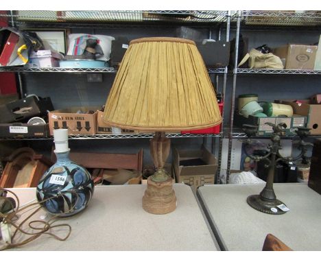 An onyx table lamp with pleated shade          