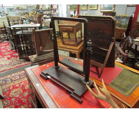 A Regency mahogany dressing table mirror with round cornered top held by two turned supports, on breakfront base, some speckl