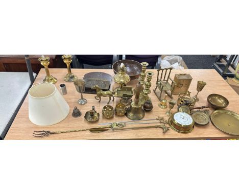 Large selection of assorted brass ware includes bells, candle stick etc 