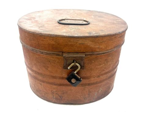 Vintage metal hat box measures approximately 12 inches tall by 12 inches wide 