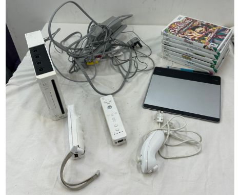 Large selection of  nintendo WII games and console, untested 