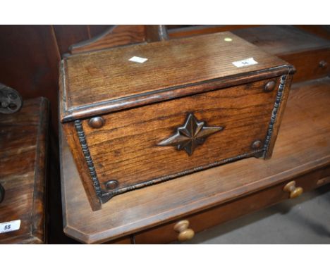 A late 19th or early 20th Century oak specimen trinket or similar box modelled as a coffer,width approx. 33cm
