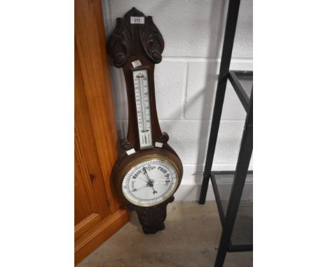 An early 20th Century oak cased barometer