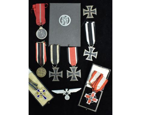 Second World War German medals, in include: Army Police Mothers Cross War Merit Cross; War Merit Cross; Iron Cross; Russian c