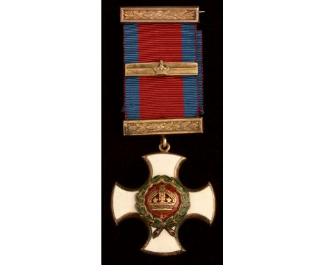 George V Distinguished Service Order and bar, unnamed enamel and silver, in Garrard &amp; Co fitted case.