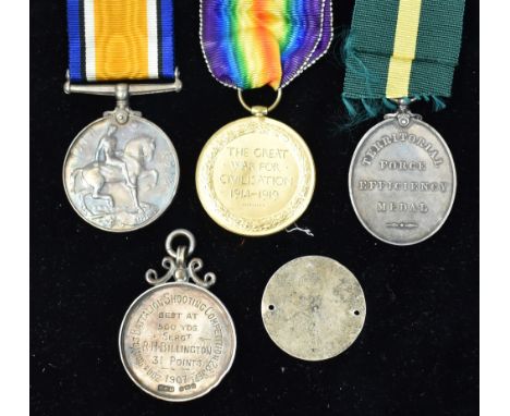 Long Service and First World War medals, comprising: First World War medal and Victory medal awarded to SPTS-4563 Private G.P