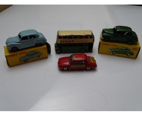 DINKY: A group of DINKY diecast to include a 159 (repainted), a 161 and two further unboxed - F/G in F/G boxes (where boxed) 