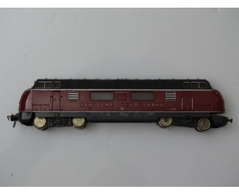 HO GAUGE MODEL RAILWAYS: A vintage FLEISCHMANN V200 Class diesel locomotive in DB red / grey livery - F/G (unboxed)