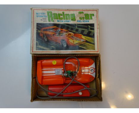 VINTAGE TOYS: A MARX battery operated racing car in original box - G in F/G box