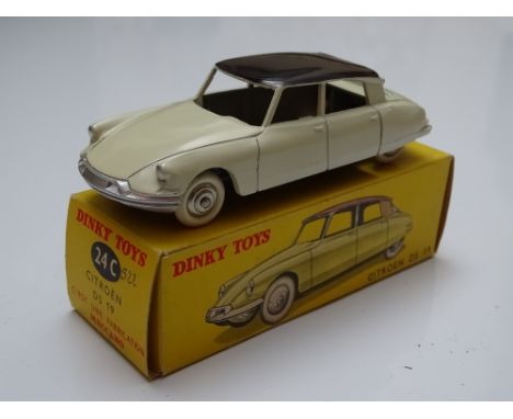 DINKY: A French DINKY 24C Citroen DS 19 in white with dark purple roof - G/VG in G box
