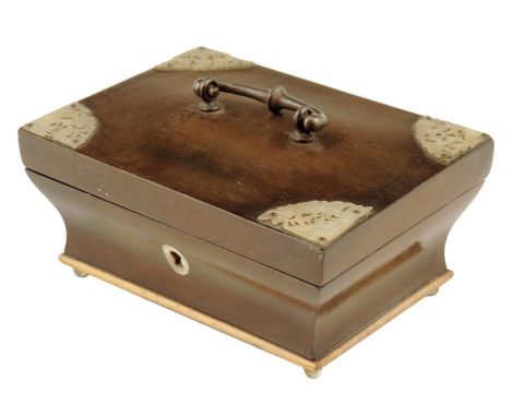 A mid 19th century French pearwood sarcophagus shape box, the hinged lid with carved mother of pearl spandrels decorated with