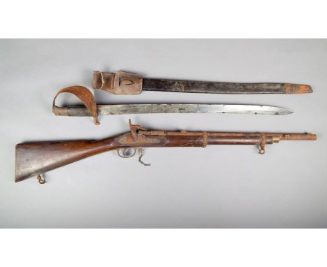 A .577 rifled Artillery Snider carbine, marked Tower 1867, complete with Artillery bayonet and scabbard. (3)Provenance: The P