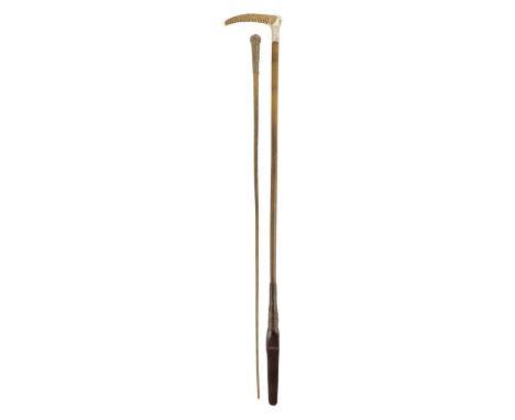 &lambda; A late Victorian rhinoceros horn lady's riding crop, the embossed silver handle by W S, Birmingham 1882, 58.5cm long