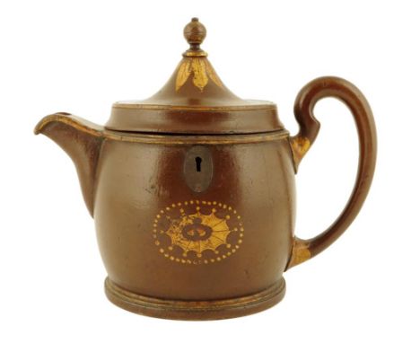 A rare painted wood teapot tea caddy, with parcel gilt decoration with a fan patera, the hinged lid with a turned finial to a