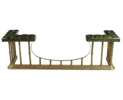 A brass club fender, with button upholstered seats on turned column supports, 52.7cm high, 174.2cm wide, 49.5cm deep.
Lot 134