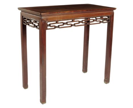 λ A Chinese rosewood side table, the panelled top above a carved fret and ball frieze on square legs terminating in scroll fe