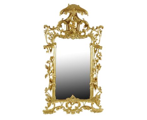 A Chippendale style giltwood wall mirror, with a leaf and acorn carved frame with 'C' and 'S' scrolls and rocaille, and with 
