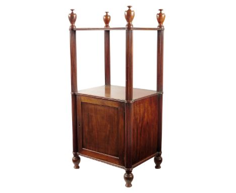 A George IV mahogany whatnot in the manner of Gillows, with vase turned finials above reeded columns, the base with a panelle