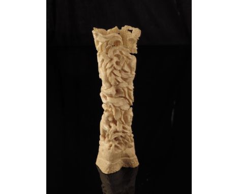A 19th century bone carving, depicting four bears climbing a tree, possibly Russian, 16.1cm high, 4.6cm wide. 