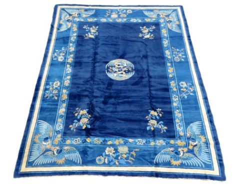 A Chinese carpet, decorated with phoenix, first half 20th century, 352 x 276cm.
Lot 21 &ndash; A Chinese carpet.&nbsp; Some o