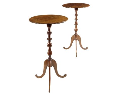 &lambda; A pair of William IV rosewood candlestands by Gillows of Lancaster, each with a fixed circular top with a moulded ed