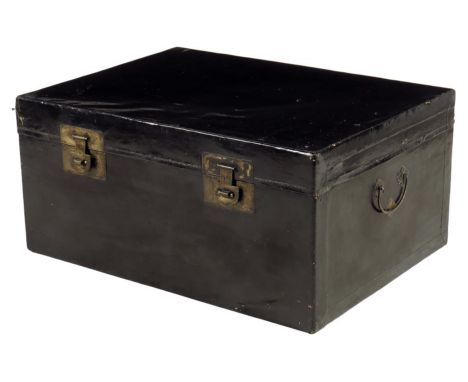 A Chinese stained vellum trunk, with brass side carrying handles and clasps, early 20th century, 38cm high, 80.3cm wide, 59.1